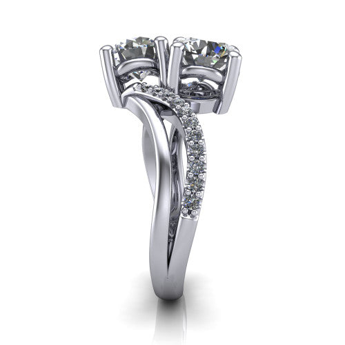 Julieta round three stone engagement ring in 18K White Gold, side profile showing the bypass split shank arms with pave diamonds running along both bands