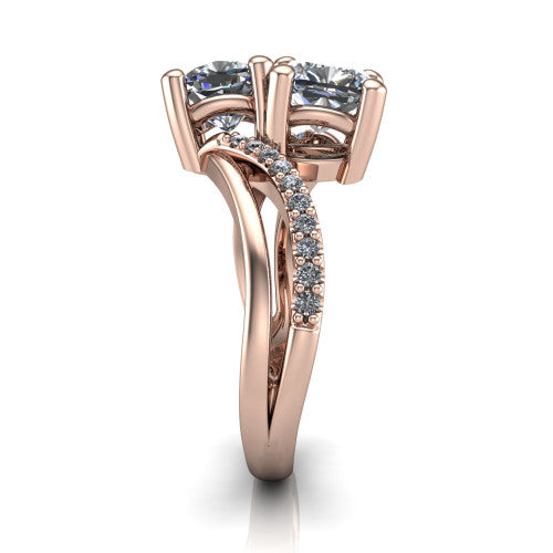 Julieta cushion three stone engagement ring in 18K Rose Gold, side profile showing the bypass split shank arms with pave diamonds running along both bands