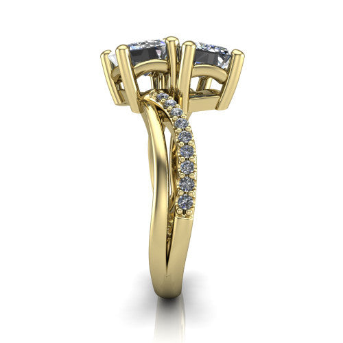 Julieta emerald three stone engagement ring in 14K Yellow Gold, side profile showing the bypass split shank arms with pave diamonds running along both bands