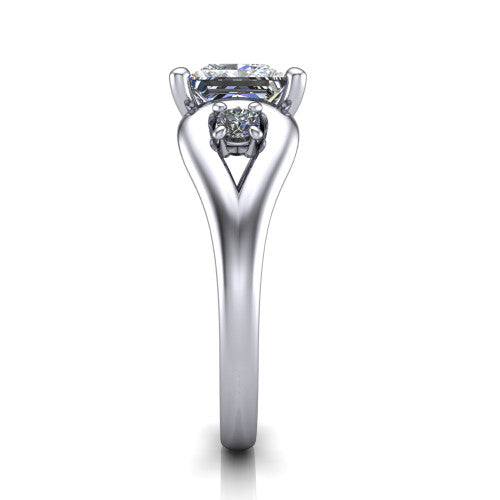 Imani princess three stone engagement ring in 18K White Gold, side profile showing the bypass loop shoulders curving through the square side frames and slim polished band