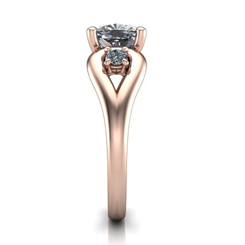 Imani cushion three stone engagement ring in 18K Rose Gold, side profile showing the bypass loop shoulders curving through the square side frames and slim polished band