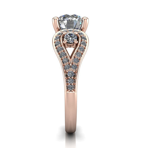 Jennifer round three stone engagement ring in 18K Rose Gold, side profile showing the pave teardrop side frame, cathedral lift, and pave split shank
