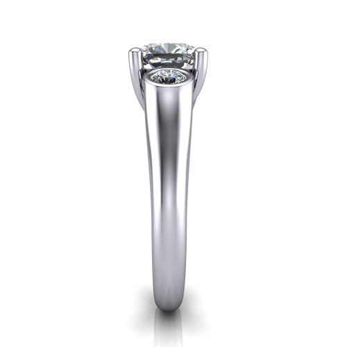 Rory cushion three stone engagement ring in Platinum, side profile showing the bezel side stones and polished band