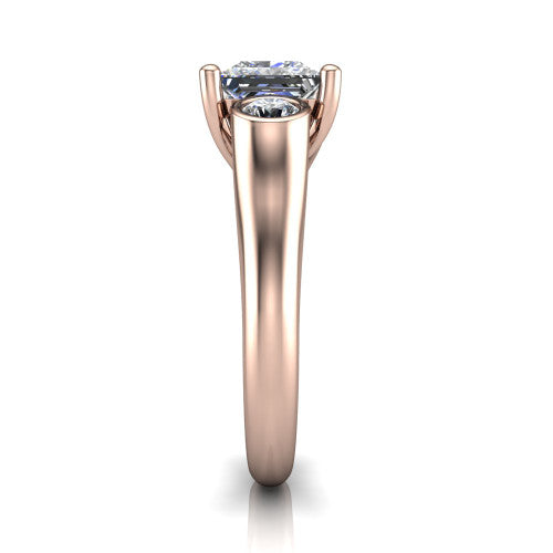 Rory princess three stone engagement ring in 18K Rose Gold, side profile showing the bezel side stones and polished band