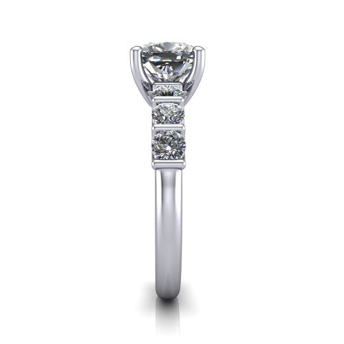 Liora cushion solitaire engagement ring in Platinum, side profile showing the side accents and polished band