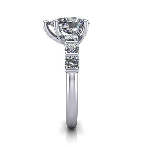 Liora pear solitaire engagement ring in 14K White Gold, side profile showing the side accents and polished band