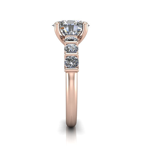 Liora oval solitaire engagement ring in 18K Rose Gold, side profile showing the side accents and polished band
