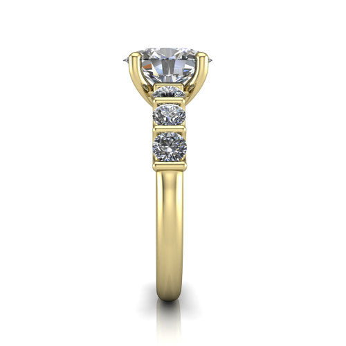 Liora oval solitaire engagement ring in 14K Yellow Gold, side profile showing the side accents and polished band