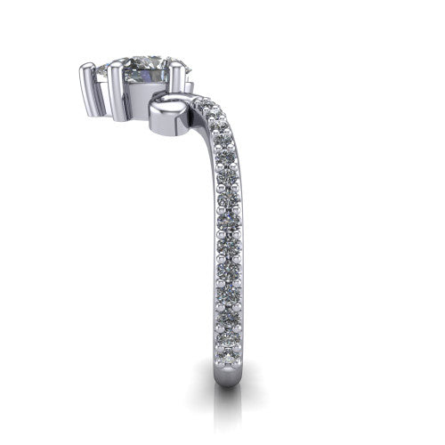 Aveline pear solitaire engagement ring in 18K White Gold, side profile showing the peaked chevron pave band