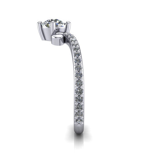 Aveline round solitaire engagement ring in Platinum, side profile showing the peaked chevron pave band