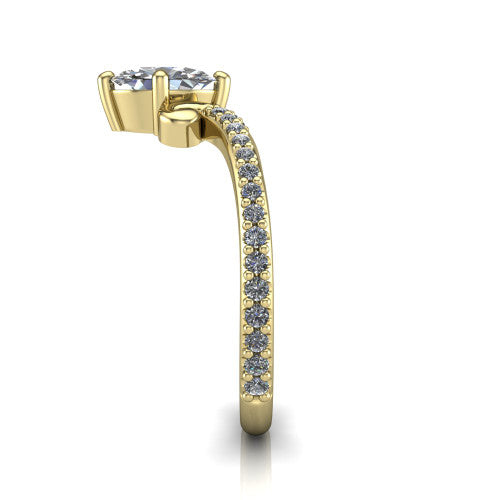 Aveline oval solitaire engagement ring in 18K Yellow Gold, side profile showing the peaked chevron pave band