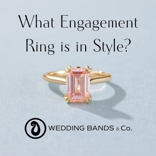 Emerald-cut pink diamond engagement ring set in yellow gold, showcasing a modern and stylish engagement ring trend by Wedding Bands & Co.
