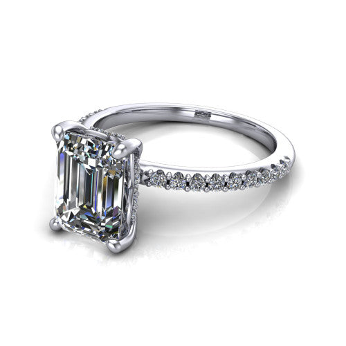 Arielle emerald classic engagement ring in 14K White Gold, three-quarter perspective showing the four-prong center above a pav&eacute; band with a hidden halo collar