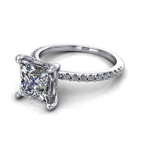 Arielle princess classic engagement ring in 18K White Gold, three-quarter perspective showing the four-prong center above a pav&eacute; band with a hidden halo collar