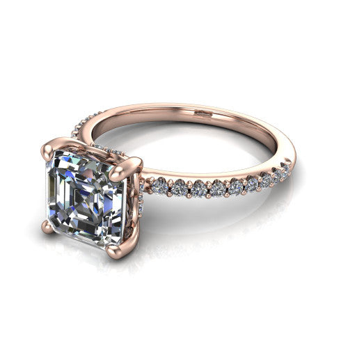 Arielle square emerald classic engagement ring in 14K Rose Gold, three-quarter perspective showing the four-prong center above a pav&eacute; band with a hidden halo collar