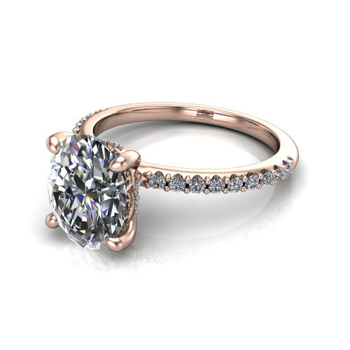 Arielle oval classic engagement ring in 18K Rose Gold, three-quarter perspective showing the four-prong center above a pav&eacute; band with a hidden halo collar