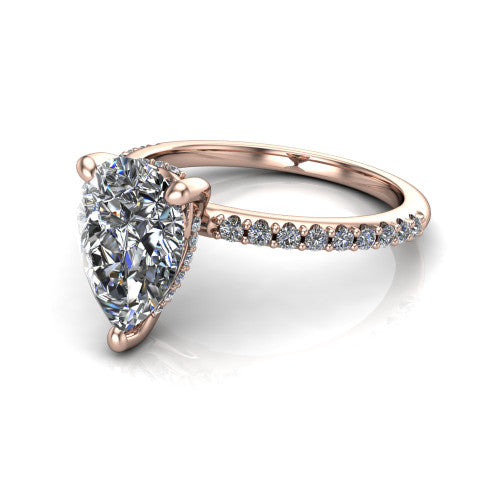 Arielle pear classic engagement ring in 14K Rose Gold, three-quarter perspective showing the four-prong center above a pav&eacute; band with a hidden halo collar