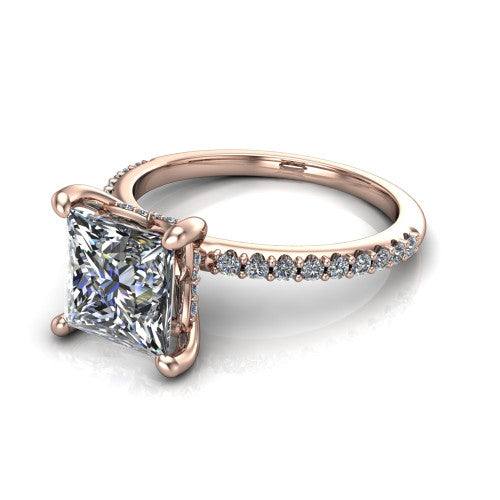 Arielle princess classic engagement ring in 14K Rose Gold, three-quarter perspective showing the four-prong center above a pav&eacute; band with a hidden halo collar