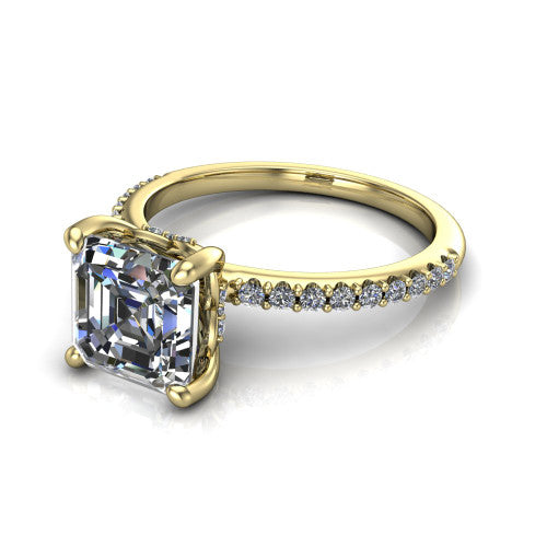 Arielle square emerald classic engagement ring in 18K Yellow Gold, three-quarter perspective showing the four-prong center above a pav&eacute; band with a hidden halo collar