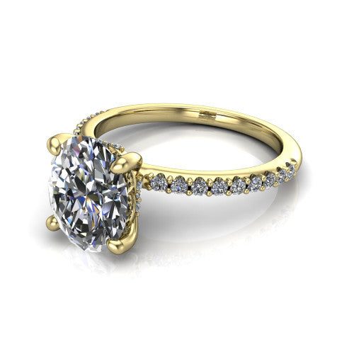 Arielle oval classic engagement ring in 18K Yellow Gold, three-quarter perspective showing the four-prong center above a pav&eacute; band with a hidden halo collar