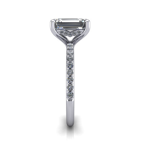 Arielle emerald classic engagement ring in Platinum, side profile showing the pav&eacute; running down the band and the hidden halo in profile