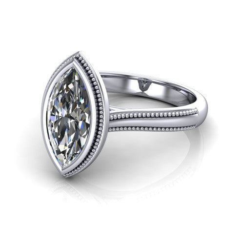 Adelina marquise solitaire engagement ring in 14K White Gold, three-quarter perspective showing the brilliant marquise center diamond, full bezel setting with milgrain detail, and tapered split-shoulder shank