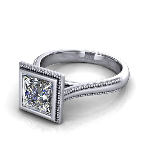 Adelina princess solitaire engagement ring in Platinum, three-quarter perspective showing the brilliant princess-cut center diamond, full bezel setting with milgrain detail, and tapered split-shoulder shank