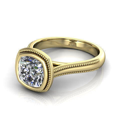 Adelina cushion solitaire engagement ring in 14K Yellow Gold, three-quarter perspective showing the brilliant cushion-cut center diamond, full bezel setting with milgrain detail, and tapered split-shoulder shank