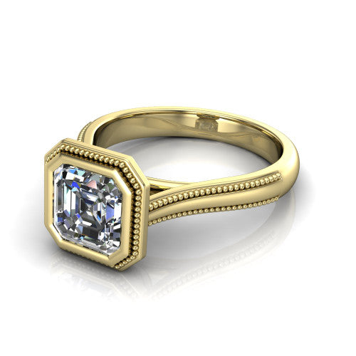 Adelina square emerald solitaire engagement ring in 14K Yellow Gold, three-quarter perspective showing the step-cut square emerald center diamond, full bezel setting with milgrain detail, and tapered split-shoulder shank