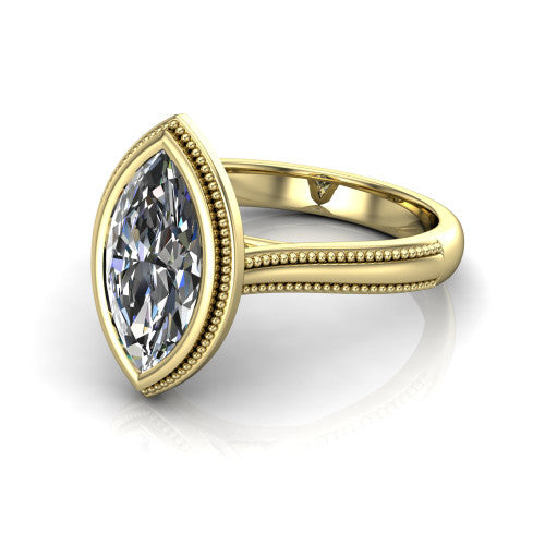 Adelina marquise solitaire engagement ring in 14K Yellow Gold, three-quarter perspective showing the brilliant marquise center diamond, full bezel setting with milgrain detail, and tapered split-shoulder shank