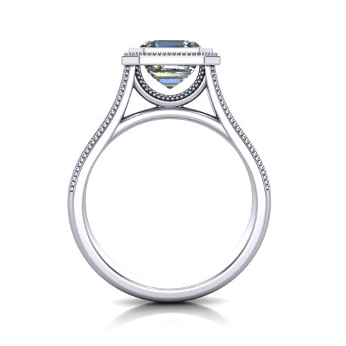 Adelina square emerald solitaire engagement ring in Platinum, through-finger front profile showing the low-profile bezel head and open cathedral under-gallery