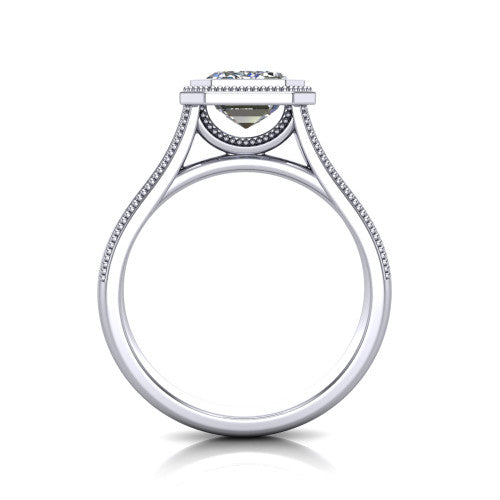 Adelina emerald solitaire engagement ring in Platinum, through-finger front profile showing the low-profile bezel head and open cathedral under-gallery