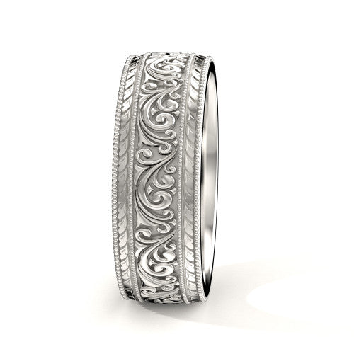 Close-up of scrollwork design on 14K white gold men's wedding band