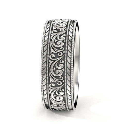 Handcrafted men's white gold wedding band featuring intricate scrollwork and engraved borders