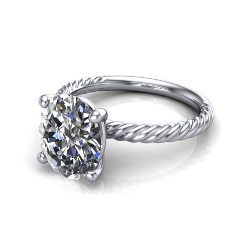 Claire oval classic solitaire engagement ring in 14K White Gold — three-quarter perspective showing the oval-cut center diamond, 4-prong setting, and twisted rope shank