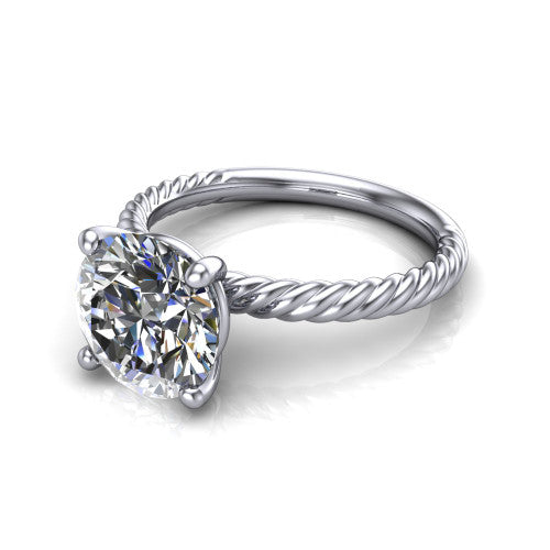 Claire round classic solitaire engagement ring in 14K White Gold — three-quarter perspective showing the brilliant round center diamond, 4-prong setting, and twisted rope shank
