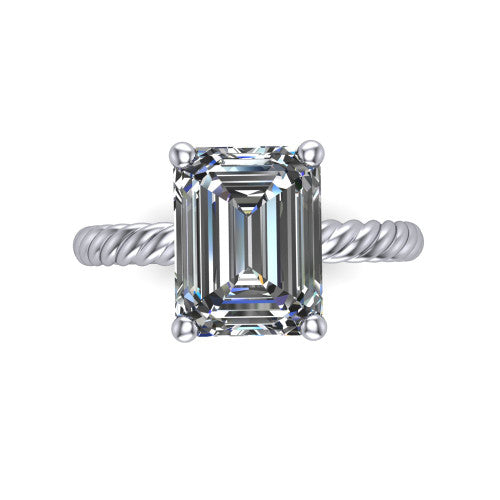 Claire emerald classic solitaire engagement ring in 14K White Gold — top-down view showing the emerald-cut center stone and four prongs
