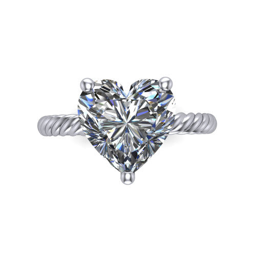 Claire heart classic solitaire engagement ring in Platinum — top-down view showing the heart-cut center stone and four prongs