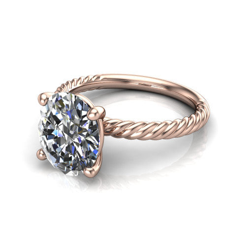 Claire oval classic solitaire engagement ring in 18K Rose Gold — three-quarter perspective showing the oval-cut center diamond, 4-prong setting, and twisted rope shank