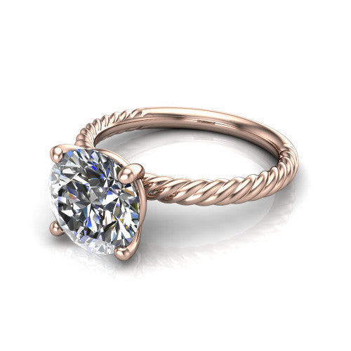 Claire round classic solitaire engagement ring in 18K Rose Gold — three-quarter perspective showing the brilliant round center diamond, 4-prong setting, and twisted rope shank