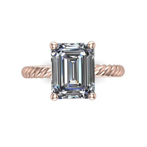Claire emerald classic solitaire engagement ring in 18K Rose Gold — top-down view showing the emerald-cut center stone and four prongs