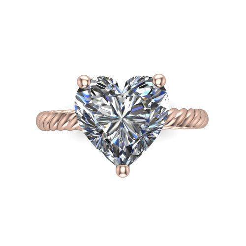 Claire heart classic solitaire engagement ring in 18K Rose Gold — top-down view showing the heart-cut center stone and four prongs