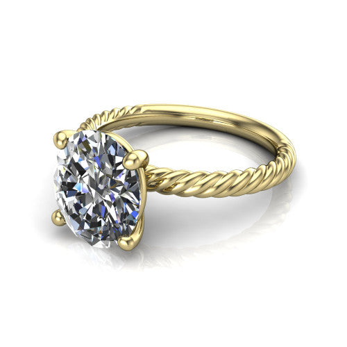 Claire oval classic solitaire engagement ring in 18K Yellow Gold — three-quarter perspective showing the oval-cut center diamond, 4-prong setting, and twisted rope shank