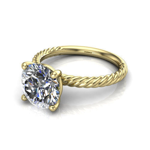 Claire round classic solitaire engagement ring in 14K Yellow Gold — three-quarter perspective showing the brilliant round center diamond, 4-prong setting, and twisted rope shank