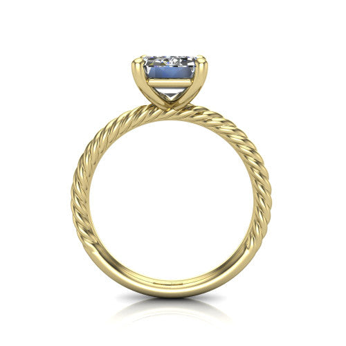 Claire emerald classic solitaire engagement ring in 18K Yellow Gold — through-finger front profile showing the open cathedral under-gallery and rope band sides