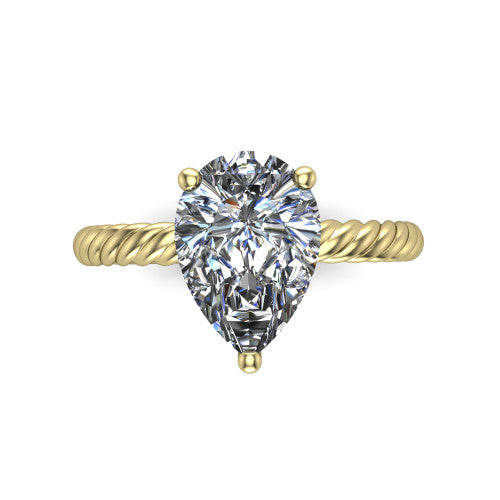 Claire pear classic solitaire engagement ring in 18K Yellow Gold — top-down view showing the pear-cut center stone and four prongs