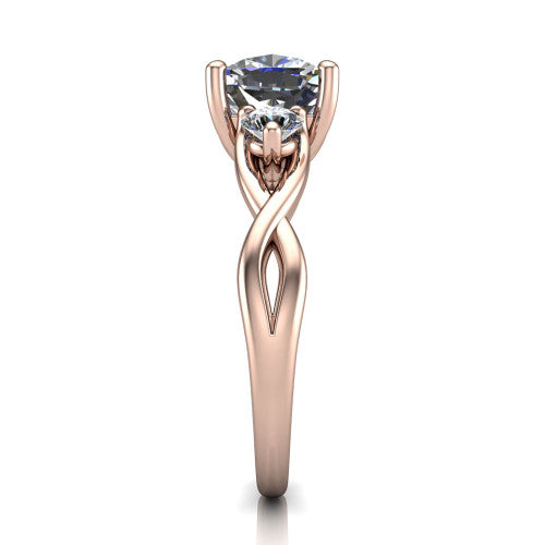 Lydia cushion three stone engagement ring in 18K Rose Gold, side profile showing the round side diamonds, floral gallery, and woven infinity shank