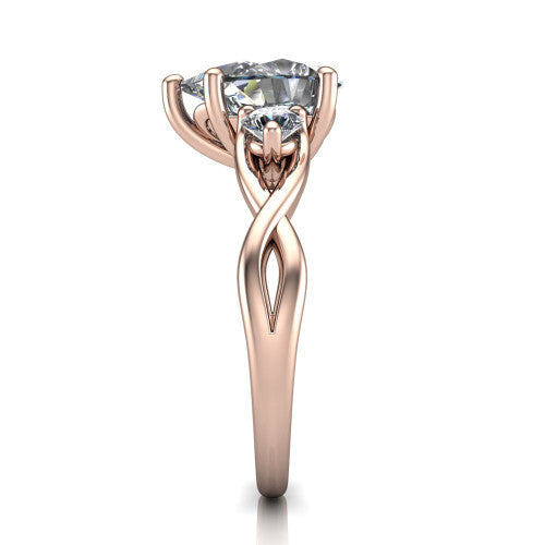 Lydia pear three stone engagement ring in 18K Rose Gold, side profile showing the round side diamonds, floral gallery, and woven infinity shank