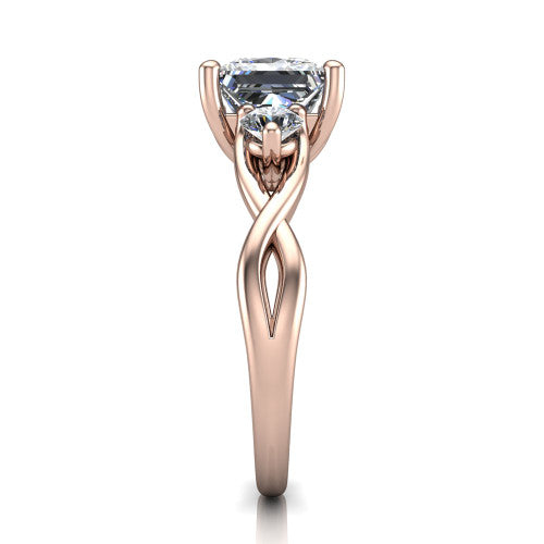 Lydia princess three stone engagement ring in 14K Rose Gold, side profile showing the round side diamonds, floral gallery, and woven infinity shank