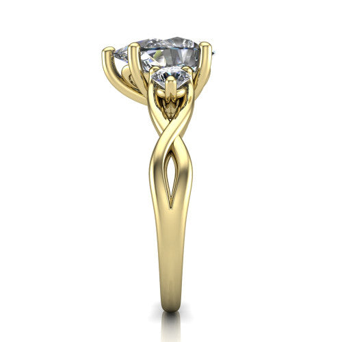 Lydia pear three stone engagement ring in 14K Yellow Gold, side profile showing the round side diamonds, floral gallery, and woven infinity shank